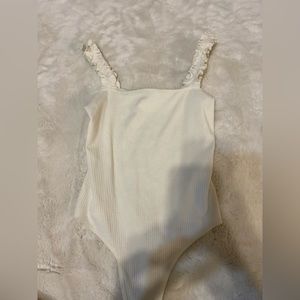White tank top body suit
